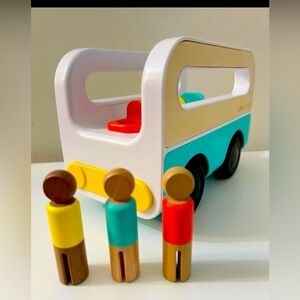Lovevery Wheel Around Town Bus Children Toy With Three Peg People The Realist